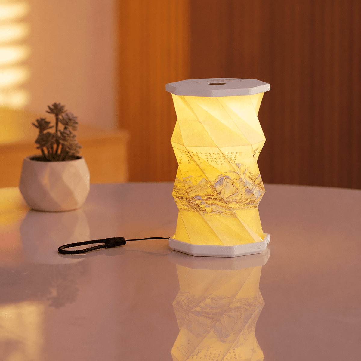 Lampe nomade à poignée OrigaLux™