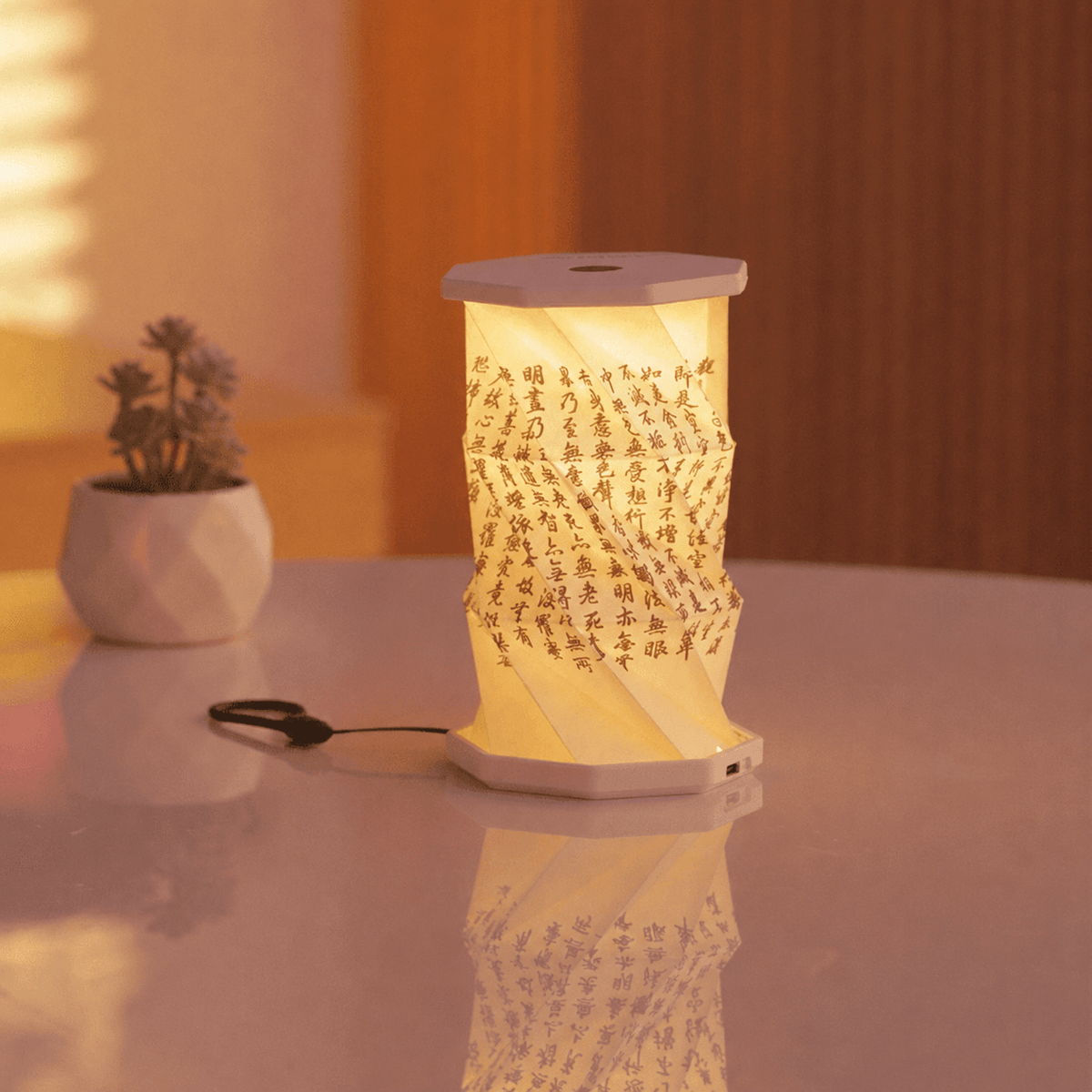 Lampe nomade à poignée OrigaLux™