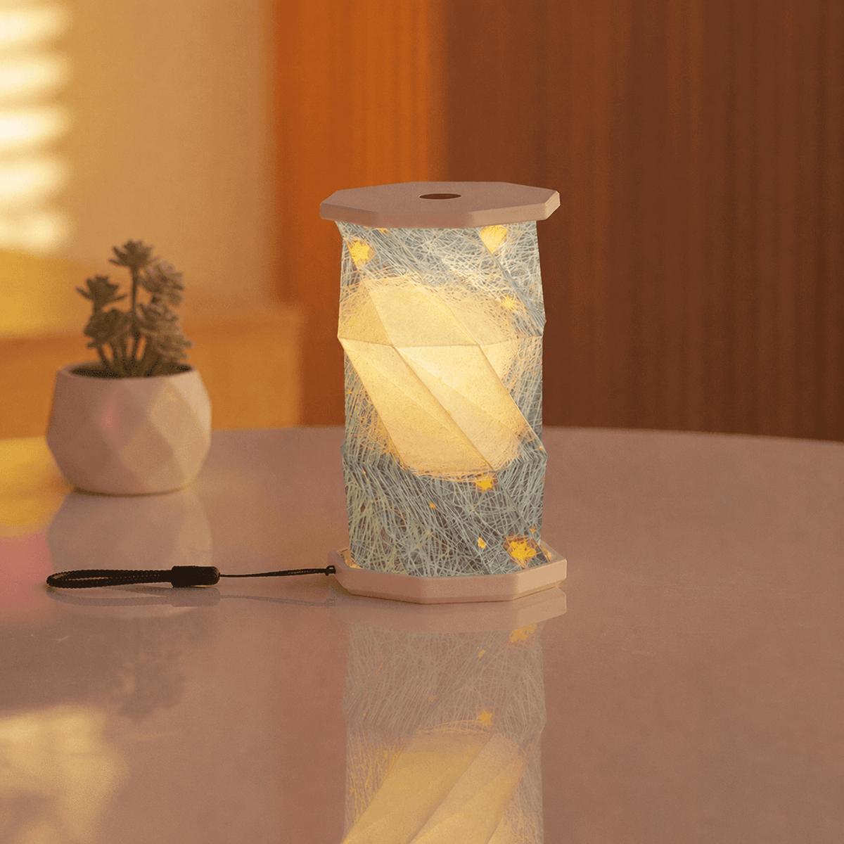 Lampe nomade à poignée OrigaLux™
